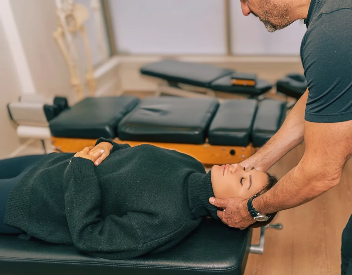 Chiropractic neck adjustment at Life Integrative in Vancouver.